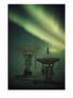 Antennas Point Skyward Under The Glowing Aurora Borealis by Norbert Rosing Limited Edition Print