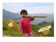 Young Girl Carrying Shoulder Pole With Straw Hats, China by Keren Su Limited Edition Print