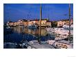 Yachts In Town Harbour With Buildings Behind, St. Tropez, France by Christer Fredriksson Limited Edition Print