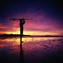 Surfer Standing On Beach At Sunset by Philip Lee Harvey Limited Edition Print