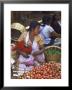 Fruit Vendor In Market Breast Feeding Her Daughter by John Dominis Limited Edition Print