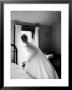 Bride Prepares For Wedding, In Traditional White Gown, 19Th Century Wedding Dress by Michael Rougier Limited Edition Print
