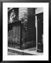 Man Standing On A Balcony Over A Lamp Post On The Rue De La Huchette by David Scherman Limited Edition Print