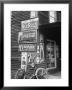 Food Store Called Leo's Place Covered With Beverage Ads Incl. Coca Cola, 7 Up, Dr. Pepper And Pepsi by Alfred Eisenstaedt Limited Edition Pricing Art Print