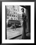 Women Standing On Sidewalk Of 5Th Avenue Across From Window Of Saks Department Store by Alfred Eisenstaedt Limited Edition Print