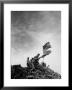 American Marines Replacing Small American Flag With Larger One Atop Mt. Suribachi by Louis R. Lowery Limited Edition Print