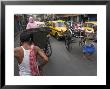 Hand Pulled Rickshaws And Yellow Taxis, Kolkata, West Bengal State, India by Eitan Simanor Limited Edition Print
