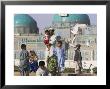 Family Feeding The Famous White Pigeons, Shrine Of Hazrat Ali, Mazar-I-Sharif, Afghanistan by Jane Sweeney Limited Edition Pricing Art Print