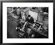 Worker Working At A Machine Inside The Innocenti Automobile Factory by A. Villani Limited Edition Print