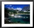 Overhead View Of Double Lake, House And Mountains, Triglav National Park, Slovenia by Grant Dixon Limited Edition Print