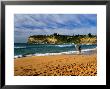 Surfer On Avalon Beach, Bilgola Headland In Background, Sydney, New South Wales, Australia by Ross Barnett Limited Edition Print