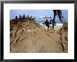 Sand Sculptures With The Sculptor Posing Under The Umbrella, Copacabana by Judy Bellah Limited Edition Print