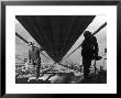 Two Workmen Adding Last Two Strands To Enormous Cables That Supports 6 Lane Golden Gate Bridge by Peter Stackpole Limited Edition Pricing Art Print
