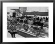 Women Shopping At A Handbag Sale At Saks 5Th Ave by Yale Joel Limited Edition Pricing Art Print