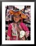 Portrait Of A Local Smiling Peruvian Girl In Traditional Dress, Holding A Young Animal, Cuzco, Peru by Gavin Hellier Limited Edition Print