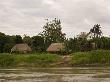 Indian Village On Rio Madre De Dios, Amazon River Basin, Peru by Dennis Kirkland Limited Edition Print