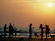 Juggling Practice On The Beach At Arambol In Goa by Paul Bigland Limited Edition Print