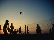 Game Of Beach Volleyball At Sunset On Arambol Beach by Paul Bigland Limited Edition Print