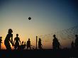 Game Of Beach Volleyball At Sunset On Arambol Beach by Paul Bigland Limited Edition Pricing Art Print