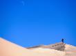 Hiker Trekking Over Sand Dunes Near Lake Mungo, Mungo National Park, Australia by Trevor Creighton Limited Edition Print