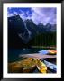 Canoeing On Moraine Lake, Banff National Park, Alberta, Canada by Lawrence Worcester Limited Edition Print