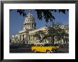 Old American Car Passing The Capitolio Nacional, Havana, Cuba, West Indies, Central America by Eitan Simanor Limited Edition Print