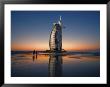 Burj Al Arab Hotel Reflected On Beach At Sunset by Merten Snijders Limited Edition Print