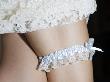Closeup Of Garter On Wedding Bride's Leg by Images Monsoon Limited Edition Pricing Art Print