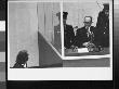 Nazi War Criminal Adolf Eichmann In A Protective Glass Booth While On Trial by Gjon Mili Limited Edition Pricing Art Print