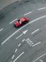 A Red Car Driving On A Multi Lane Street by Anders Lindh Limited Edition Print