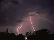 Lightning Over Floodlit Building, Pusztaszer, Hungary by Bence Mate Limited Edition Print