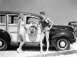 Men And Women In Bathing Suits In Front Of 1938 Ford Station Wagon by H. Armstrong Roberts Limited Edition Pricing Art Print