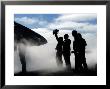 A Flight Deck Crew Member Shows The Pilot Of An F/A-18 Hornet The Aircraft's Weight by Stocktrek Images Limited Edition Pricing Art Print