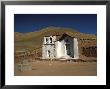 Exterior Of A Small Church In Arid Landscape Near Al Tatio Geysers, Atacama Desert, Chile by Mark Chivers Limited Edition Print