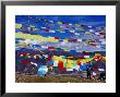 Pilgrim Stringing Up Prayer Flags With Mountains In Background by Krzysztof Dydynski Limited Edition Print