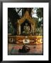 Buddhist Monk Meditating Near Altar With Buddha Statue And Gilt by Steve Winter Limited Edition Pricing Art Print