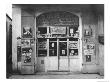 View Of The Front Of A Neighborhood Drugstore In Cyprus by W. Robert Moore Limited Edition Print