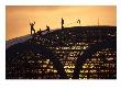 Construction Workers On Dome Of Swimming Pool At Sunset, Qinhuangdao by Raymond Gehman Limited Edition Print