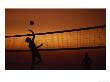 Silhouette Of Two Men Playing Volleyball by Mitch Diamond Limited Edition Print