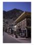 A Classic Western Downtown Street With Mountains Looming In The Back, Georgetown, Colorado by Taylor S. Kennedy Limited Edition Print