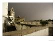 Rain And Sun Play On Castle Walls In Lisbon by Stephen Alvarez Limited Edition Print