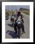 Hell's Angels Riding Motorcycles On Road by Bill Ray Limited Edition Pricing Art Print