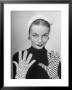 Model Martha Boss, Modeling Mismatched Gloves by Nina Leen Limited Edition Pricing Art Print