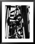 Workers Lower Pipe Into Oil Well Inside Rig In A Texaco Oil Field by Margaret Bourke-White Limited Edition Pricing Art Print