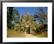 The Entrance Gate To Angkor Thom, Angkor, Siem Reap, Cambodia by Maurice Joseph Limited Edition Print
