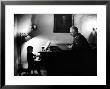 Piano Teacher Giving Lesson To Young Student In A Carnegie Hall Studio by Alfred Eisenstaedt Limited Edition Print