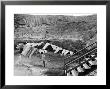Woman Hanging Laundry With Land Erosion In The Background by Alfred Eisenstaedt Limited Edition Print