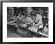 Teammates Little Golds Football Having Soda At Robertson's Drugstore by Francis Miller Limited Edition Pricing Art Print