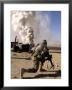 A Us Army Soldier Reacts To A Controlled Explosion by Stocktrek Images Limited Edition Print