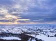 Sinking Sun And Stormy Clouds Over A Snow Covered Gormire Lake From Sutton Bank, Edge Of The North by Lizzie Shepherd Limited Edition Pricing Art Print